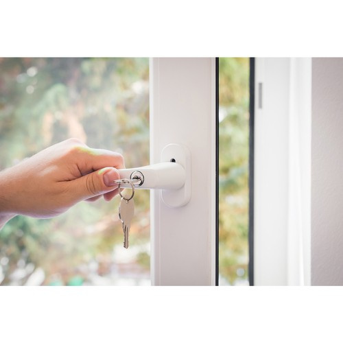 Window With A Lockable Handle And Keys Closed By A Male Hand, Childproof Window Concept